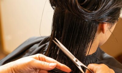 Hair stylist working with a client in a professional salon