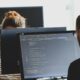 Software testing and QA professionals working with computers
