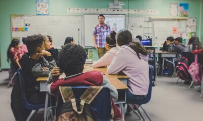 Teacher leading a classroom lesson in the UK