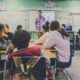 Teacher leading a classroom lesson in the UK