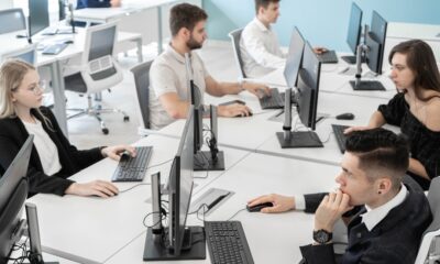 Technology professionals planning IT systems in an office