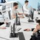 Technology professionals planning IT systems in an office
