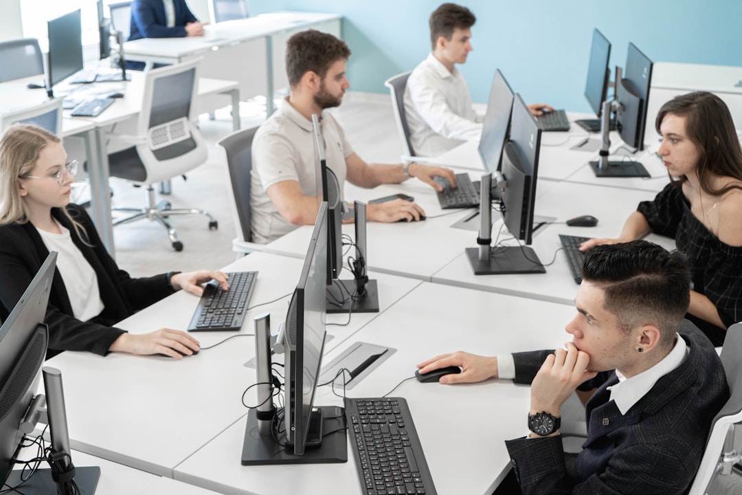 Technology professionals planning IT systems in an office