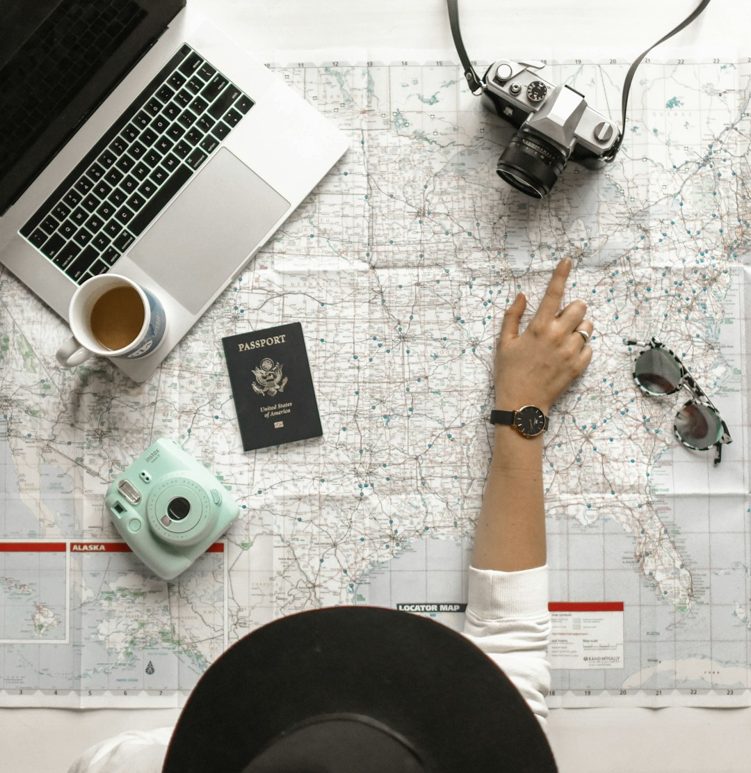 Travel professional planning a journey using a map