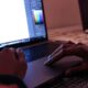 UX and UI designer working on a computer